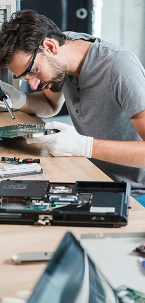 Technician Repairing a Computer